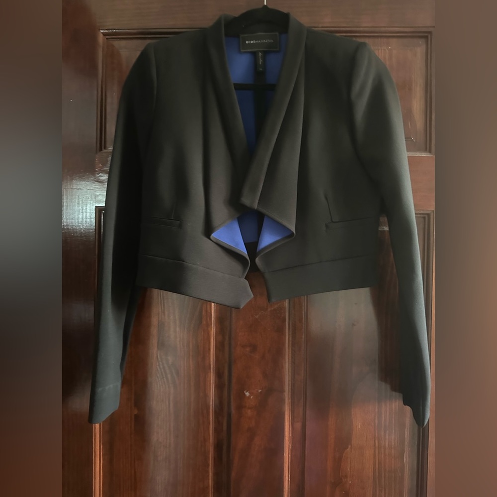 Bcbg jacket worn once drycleaned has some stretch. Stretchy material along arms.